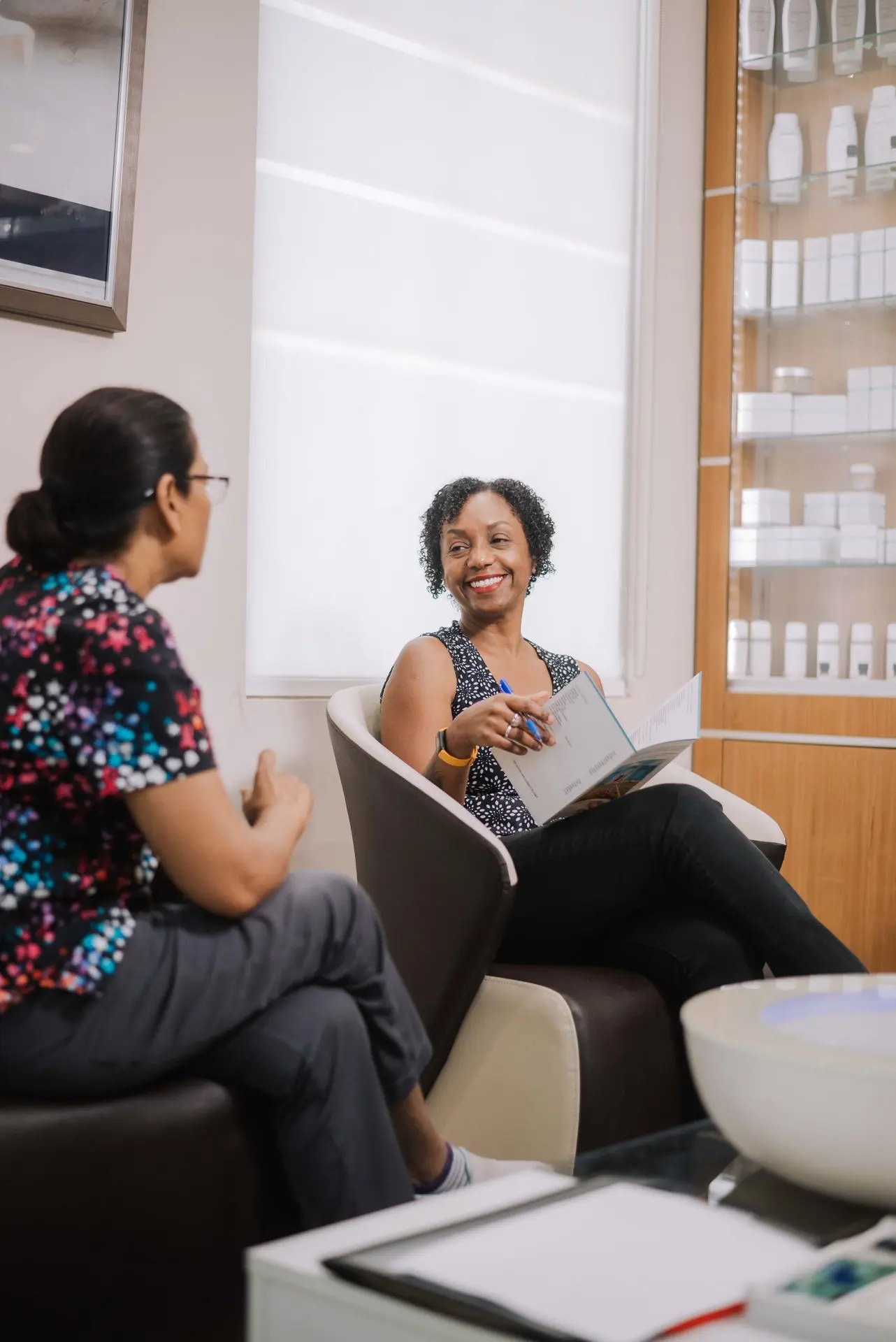 Client consultation at Mille Fleurs Clinic spa services Port of Spain